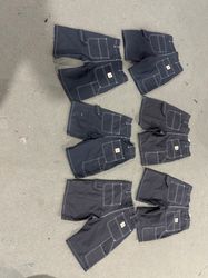 Shorts Carhartt bianchi con cuciture a vista stile..