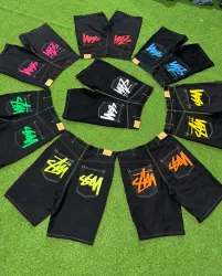 Shorts colorati in stile rework di Stussy.