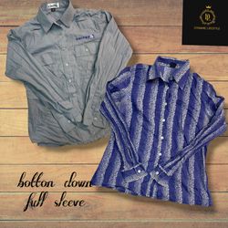 Camicie a maniche lunghe con bottoni.