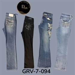 Jeans acampanados bordados Y2K – Detalle de costur..
