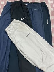 ミックスブランドのトラックパンツ