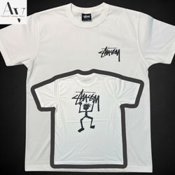 StussyのリワークスタイルのWorries Tシャツ（ホワイト）
