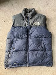 The North Face vest puffers