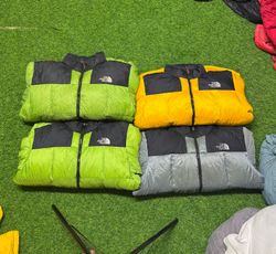 TNF Pufferjacken
