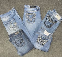 Jeans bordados de Y2K de corte acampanado