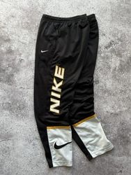 Classici pantaloni da corsa premium Nike