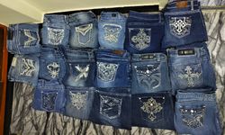 Jeans com bolsos bordados Embellish