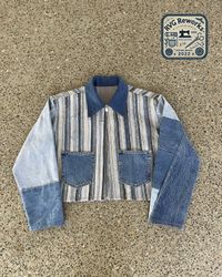 Veste à coutures recyclées