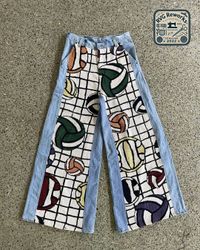 Pantalon en denim à panneau de tapisserie