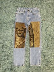 Pantaloni riciclati con arazzo (stile a doppio gin..