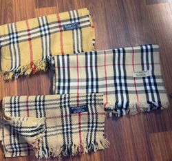 Burberry scarves in beige all designs