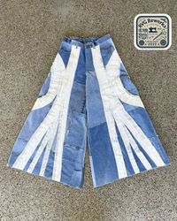 Pantalons à jambes larges en denim recyclé et dent..