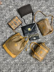 「Gucci、Fendi、Christian Dior、Celine & Burberrys バンド..