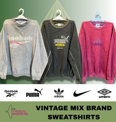 Sweatshirts vintage incluant Nike, Adidas, Puma, R..