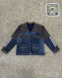 Veste de sport en denim et cuir upcyclés