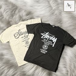 T-shirt blanc et noir Stussy reworkstyle devant et..
