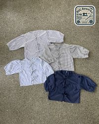 アップサイクルチェックのレースアップブラウス