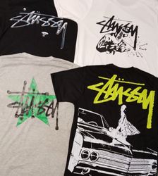 Magliette in stile mix rework stampate Stussy