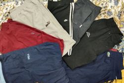 ミックス ブランドのトラックパンツ