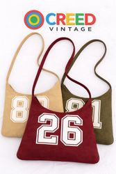 CR1132 Upcycled Sports Jersey Schultertasche
