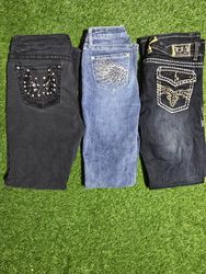 Jeans flare/bootcut avec embellissements/broderies..