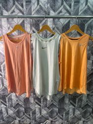 AV-1032 Nike Tank Tops