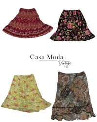 300426-1 Floral printed poly skirts 15 pcs