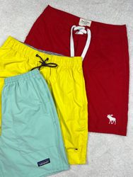 Mezclar pantalones cortos deportivos de marca