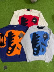 Upcycled Nike patchwork sweatshirt