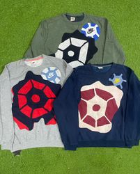 Sudadera de parches de araña reciclados de Nike
