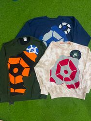 Sudadera de parches de spider reciclados de Nike