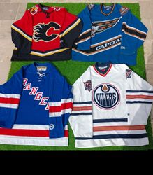 NFL NHL NBA & MLB jerseys (92) PCs