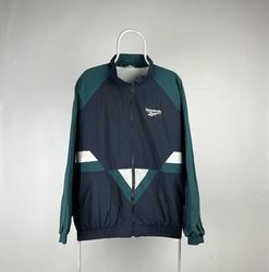 ミックス ブランドの ウインドブレーカー ジャケット