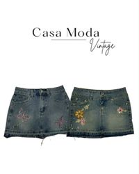 301026-8 jupes mini en denim 15 pcs