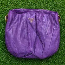 Coach, Guess and Prada Handbags