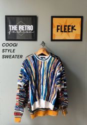 #749 COOGI STYLE SWEATER
