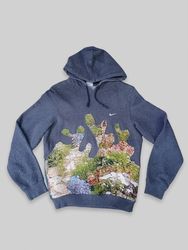 Pull à capuche Nike upcyclé avec tapisserie