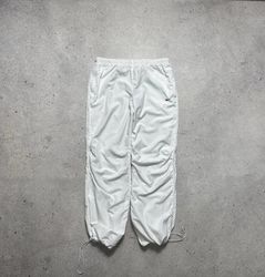 NIKE BAGGY TRACK PANTS