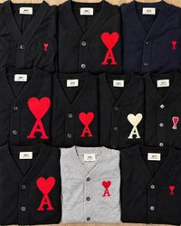 Cardigans avec le logo cœur AMI PARIS | Tricots de..