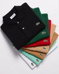 Chemises Polo à manches courtes Lacoste