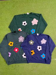 Pull en patchwork Nike Upcycle