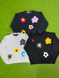 Sweetshirt en patchwork de marque Nike en upcyclin..