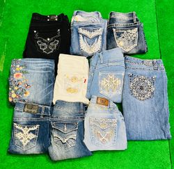 Embroidered and Distressed Flare Jeans