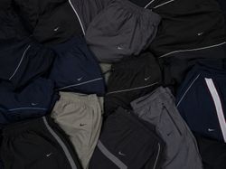 NIKE BAGGY TRACK PANTS
