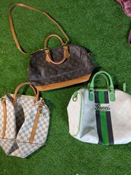  bolsas da marca Gucci e LV