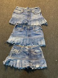Jupes mini en denim Miss Me, True Religion et Rock..