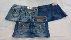 CR12097 UPCYCLED MIX BRANDED KIDS’ MINI DENIM SKIR..