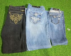 L.A.IDOL USA. ET AUTRES MARQUES MIXTES JEANS ÉVASÉ..