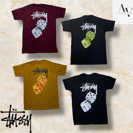 T-shirts de style révisé Stussy avec dés de toutes couleurs.