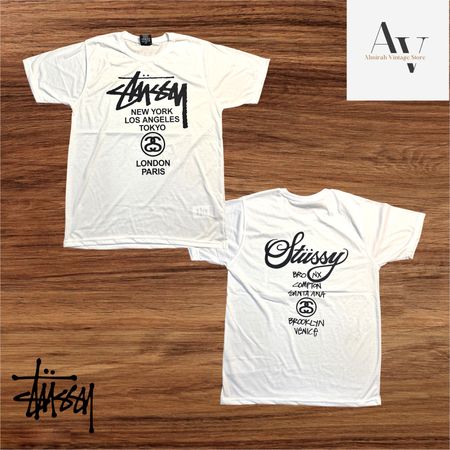T-shirts imprimés devant et derrière en style retravaillé Stussy world tour.